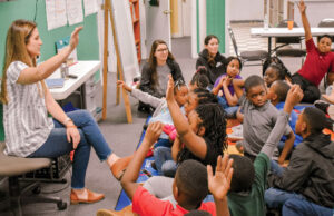 Students at the Building Hope Community Life Center receive instruction and encouragement from adult role models.